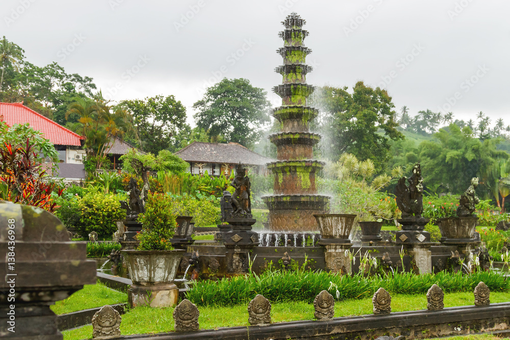 Water Palace of Tirta Gangga. Landmark in Bali, Karangasem, Indonesia. Winter rainy season.