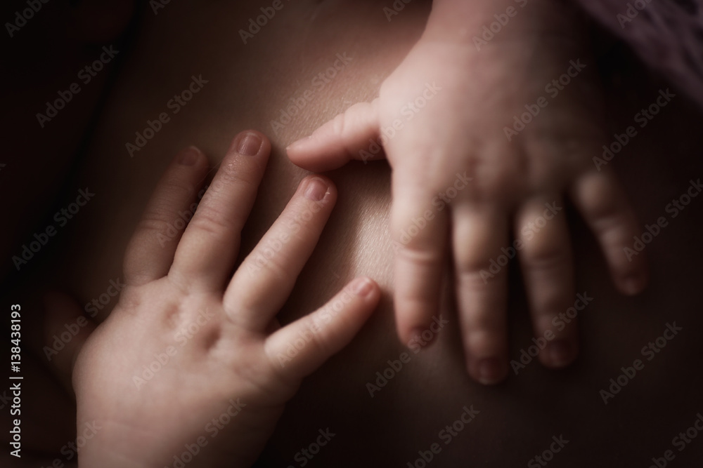 gentle fingers and hands newborn baby close-up gentle fingers and hands newborn baby close-up