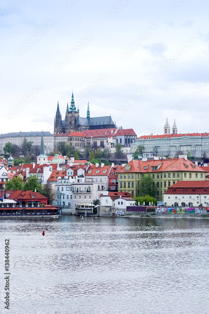 Old Town ancient architecture and river pier in Prague, Czech Republic