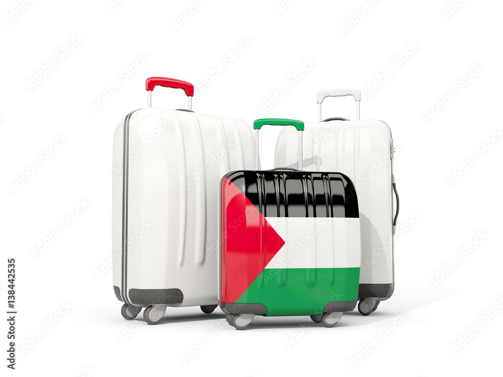 Luggage with flag of palestinian territory. Three bags isolated on white Luggage with flag of palestinian territory. Three bags isolated on white