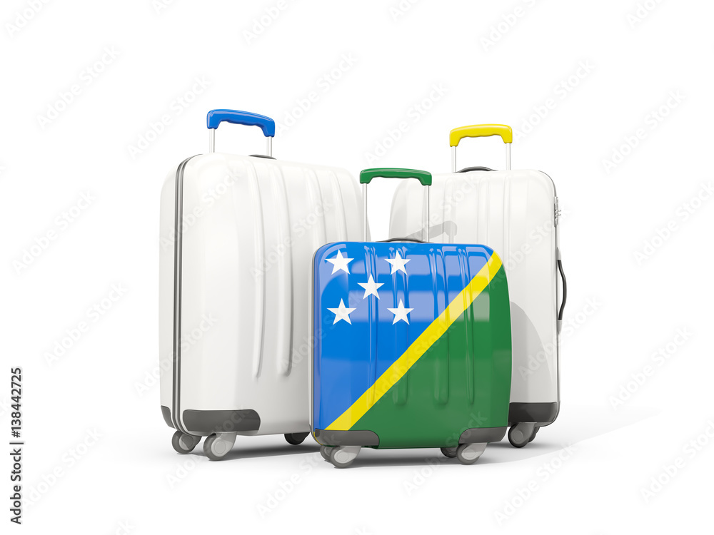 Luggage with flag of solomon islands. Three bags isolated on white Luggage with flag of solomon islands. Three bags isolated on white