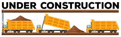 Underconstruction scene with three dump trucks