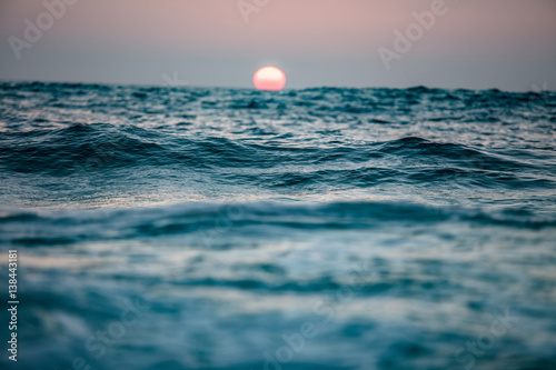 Sunset in ocean © willyam