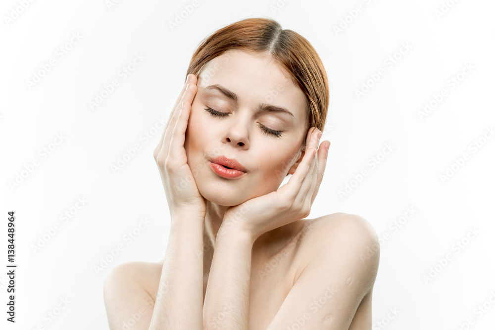 beautiful woman with closed eyes and hands near face beautiful woman with closed eyes and hands near face
