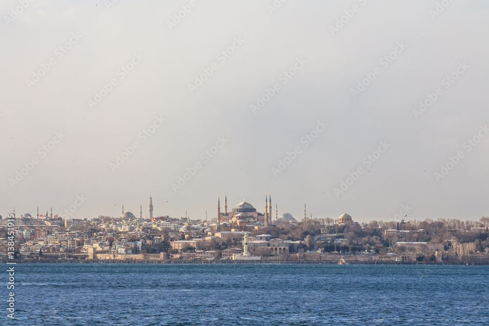 Ayasofya - Saint Sophia Mosque - Basilica seen from Bosphorus strait in winter, Istanbul, Turkey.