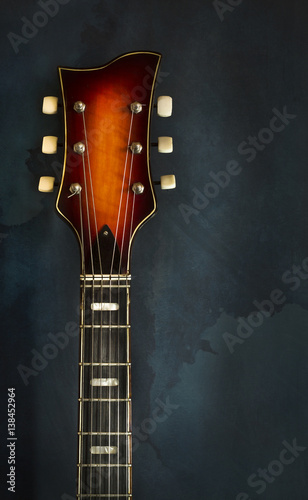 Close-up of headstock old electric jazz guitar