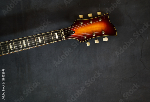 Photography Close-up of headstock old electric jazz guitar