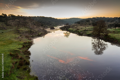 Sunrise in the Salor river, near Aliseda. Extremadura. Spain.