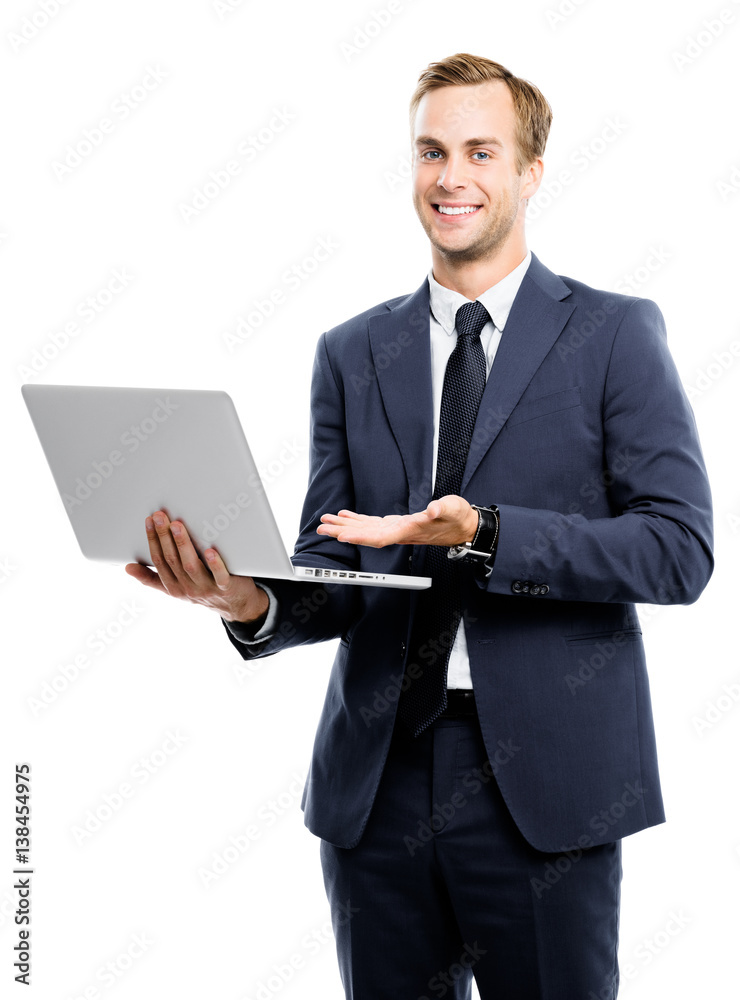 Businessman using laptop, isolated Businessman using laptop, isolated