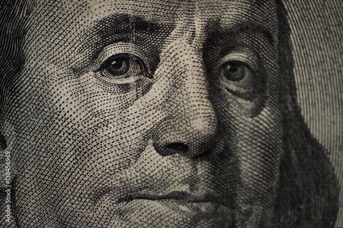 Hundred dollars bill - Benjamin Franklin. Selective focus