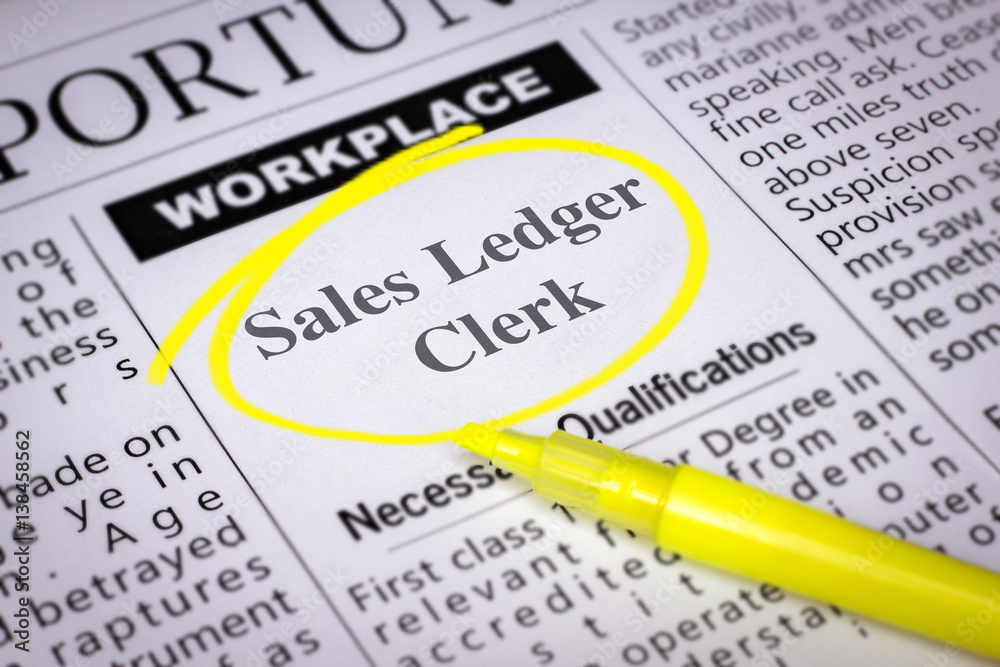 Fototapeta premium Sales Ledger Clerk - Newspaper sheet with ads and job search, circled with yellow marker, Blurred image and selective focus