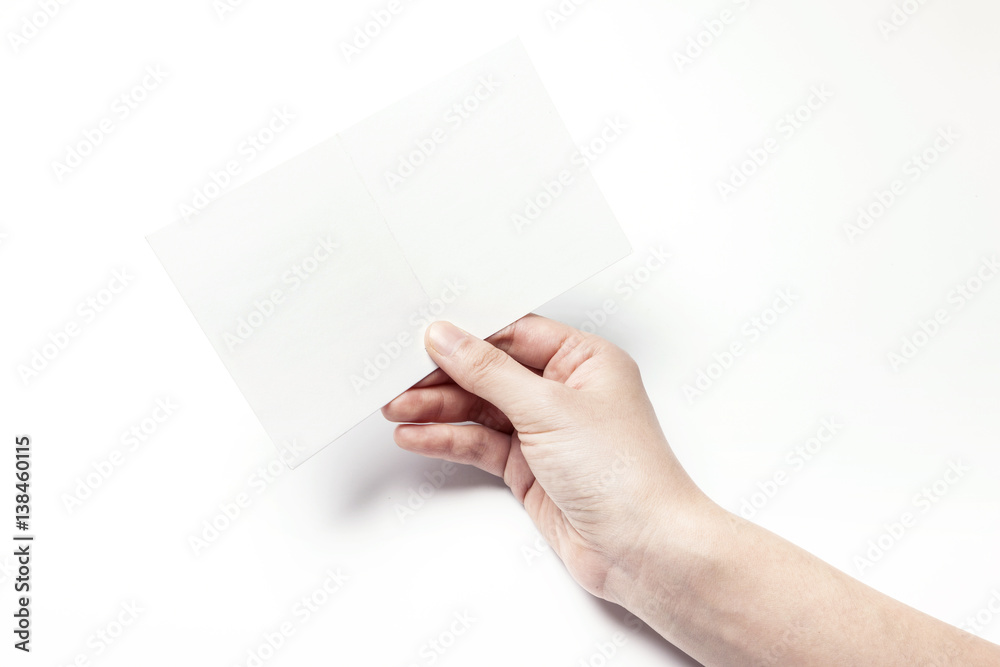 woman hand hold a empty post card isolated white. woman hand hold a empty post card isolated white.