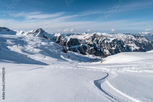 Winter in Swiss alps on a sunny day during a freeride session