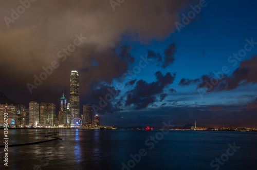 Hong Kong central business district over Victoria Bay at night
