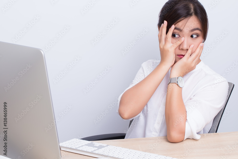 Woman use computer and she afraid something Woman use computer and she afraid something