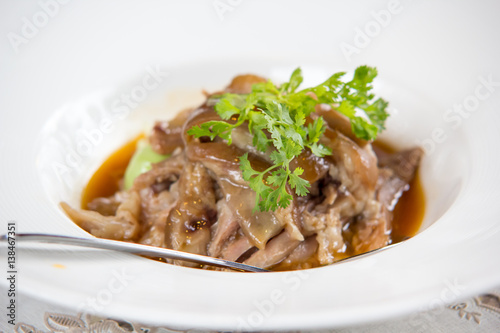 Chinese food a steamed pork on rice dish