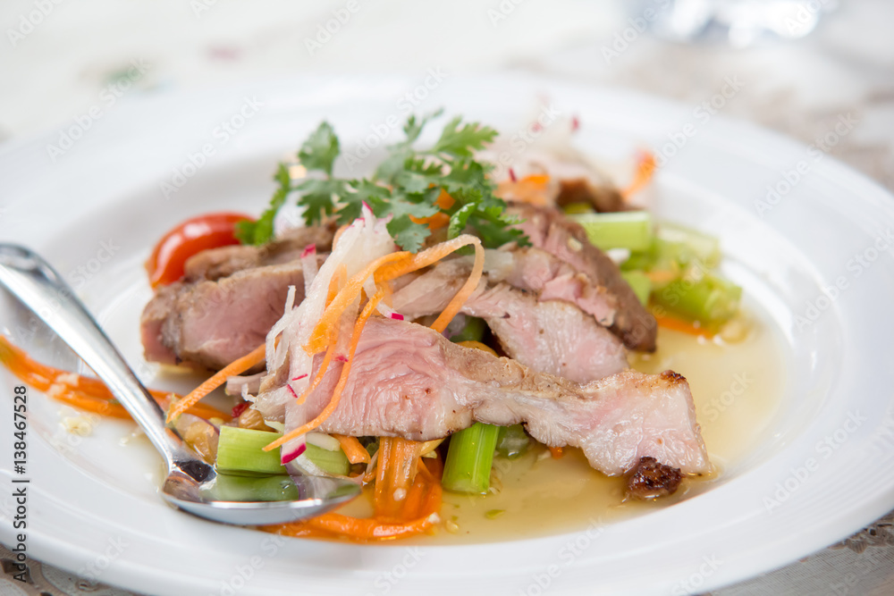 Roasted pork salad with Spicy sauce Thai traditional cuisine Roasted pork salad with Spicy sauce Thai traditional cuisine