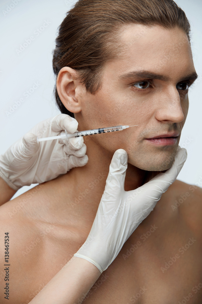 Male Beauty Injection. Handsome Man Receiving Facial Injections Male Beauty Injection. Handsome Man Receiving Facial Injections