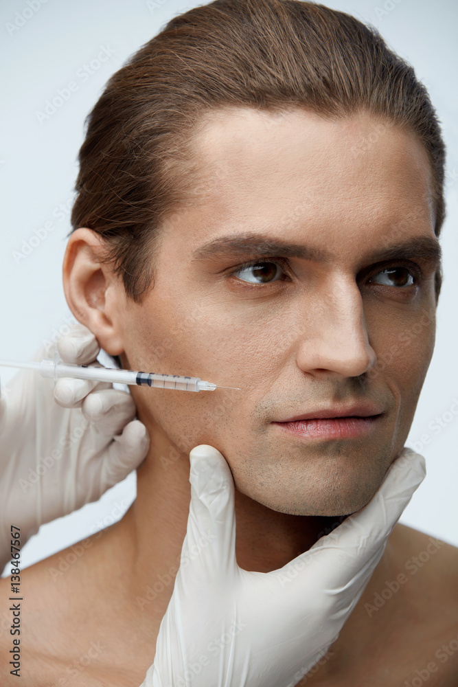 Male Beauty Injection. Handsome Man Receiving Facial Injections Male Beauty Injection. Handsome Man Receiving Facial Injections