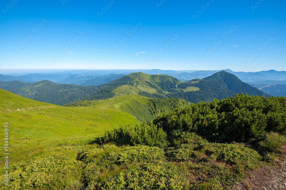 Magic landscape - green mountains covered with green grass Magic landscape - green mountains covered with green grass