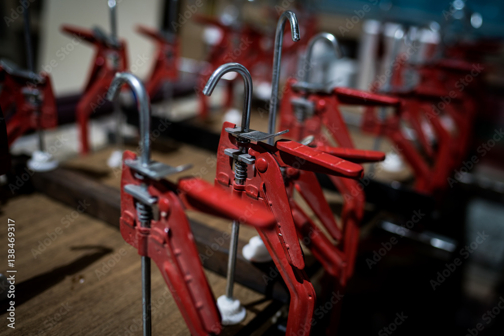 Many red clamps