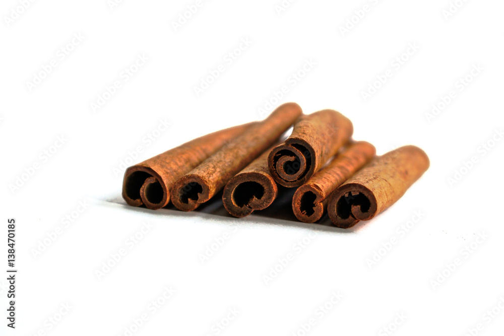 Closeup of cinnamon sticks on a white background Closeup of cinnamon sticks on a white background