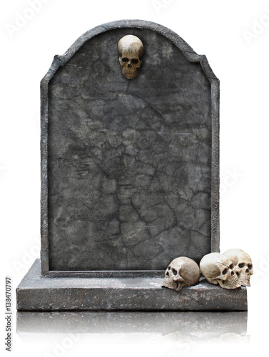 Valokuvatapetti Tombstone with skull isolated with clipping path.