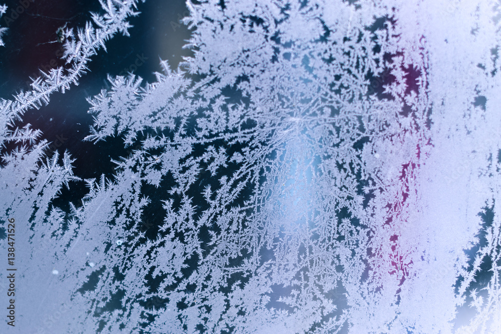 Frosty patterns on the window background Frosty patterns on the window background