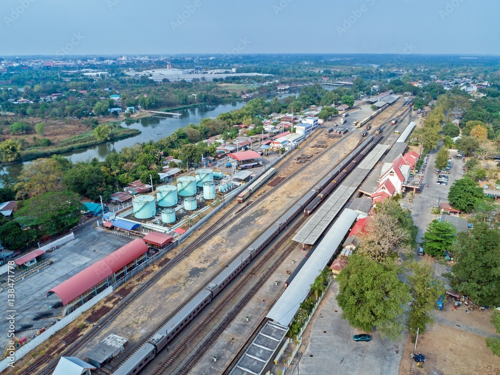 Fototapeta Aerial view of goods train and railway track - Diesel Engine train. Top view of DIESEL LOCOMOTIVE.