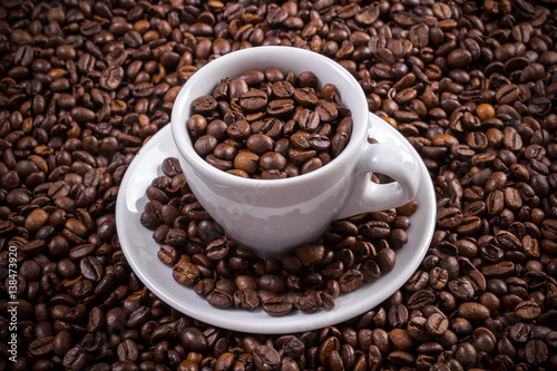 Coffee cup with coffee beans