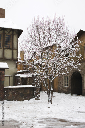 The buildings of the medieval city in winter
