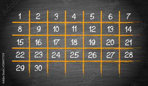 Monthly Calendar with 30 days on chalkboard background