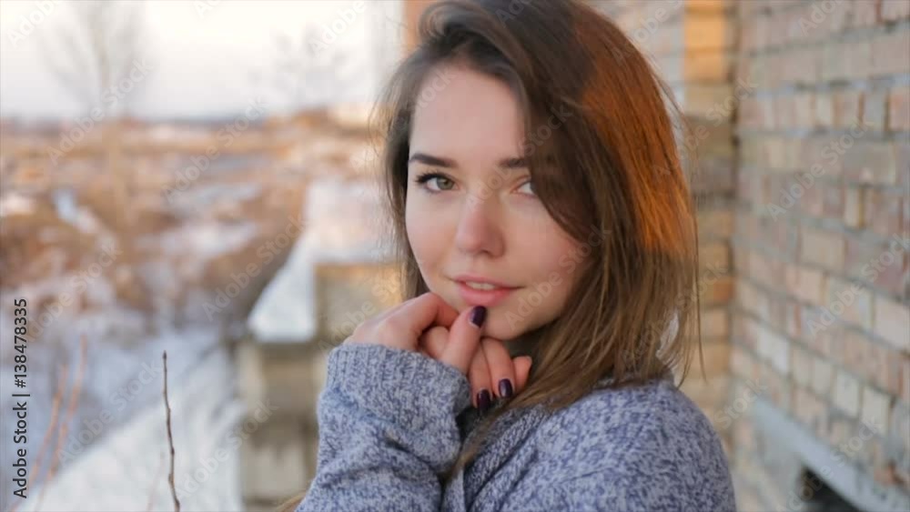 Frozen girl in an abandoned construction site.slow-motion Frozen girl in an abandoned construction site.slow-motion