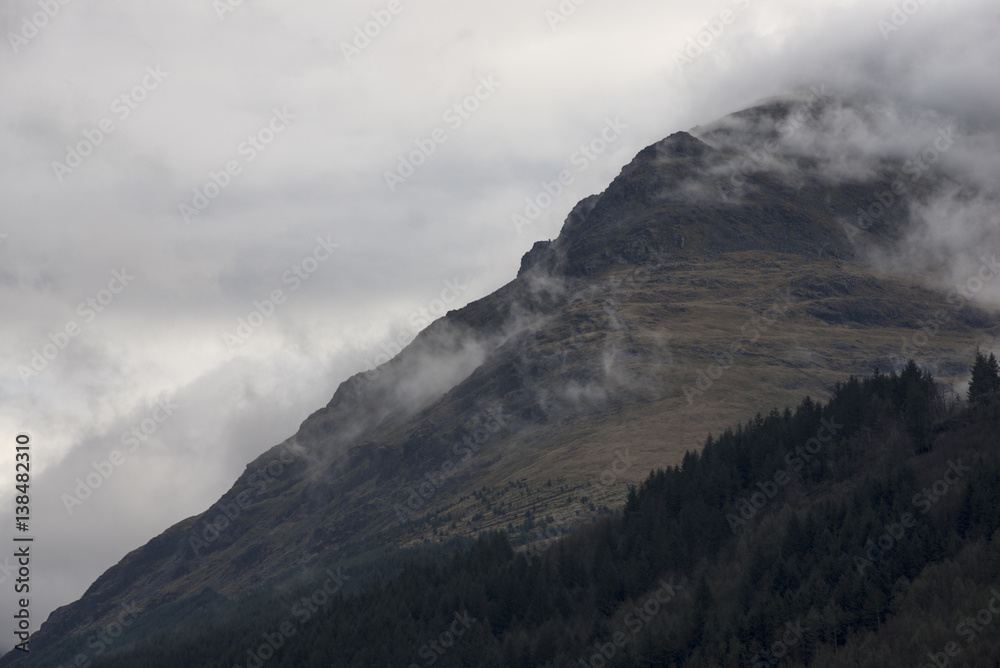 The slopes of Lingmell fell in the clouds in Ennerdale in the English Lake District in winter