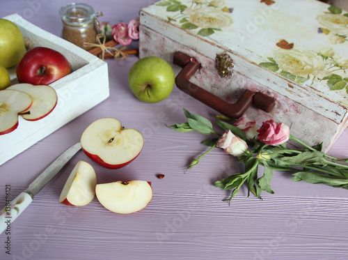 Group of red and yellow apples on the lili background