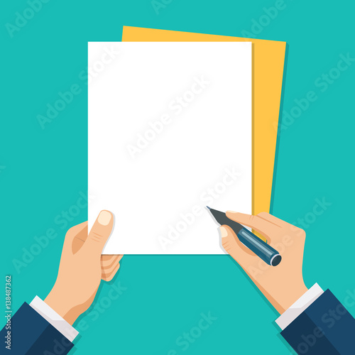 Hand holding pen over white paper sheet.
