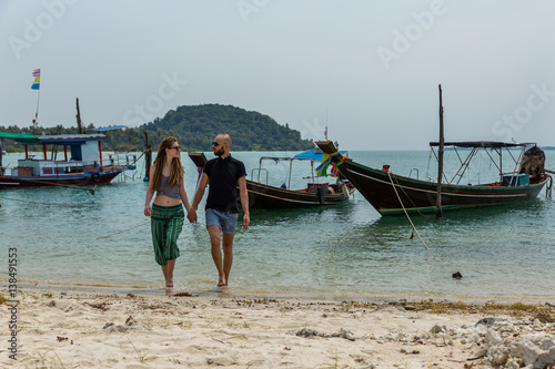 Young couple on the beach © Santorines