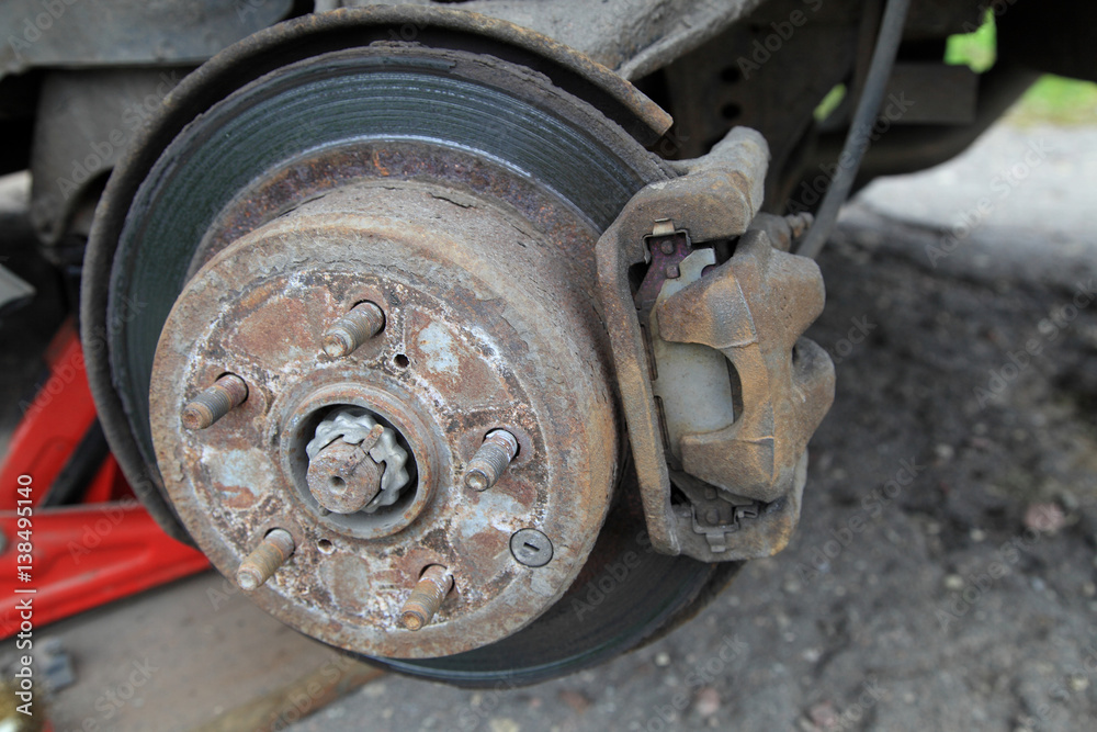 Car brakes in poor condition. Old rusty brakes