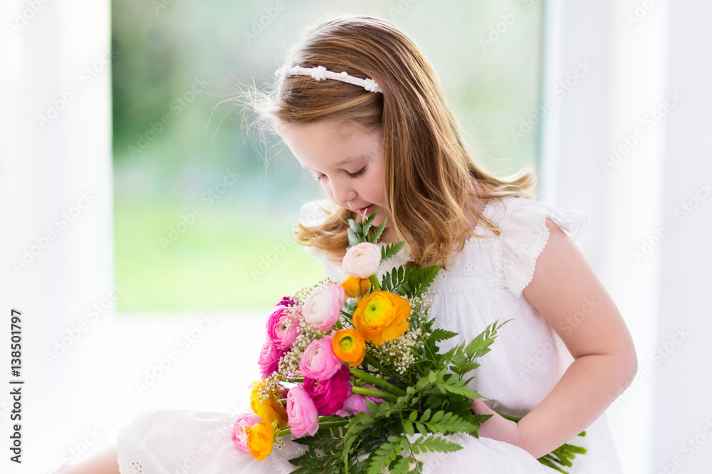 Little girl with flower bouquet