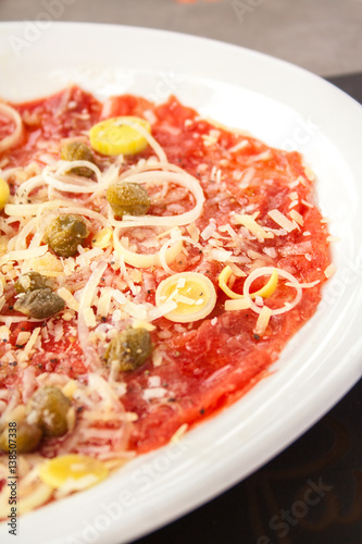Carpaccio of salmon with cheese and Olives
