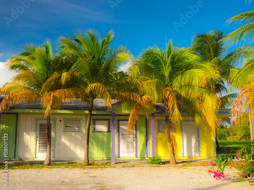 Grand Cayman, Cayman Islands, vacant apartment building, Caribbean-style, shaded by palm trees © Eric Laudonien
