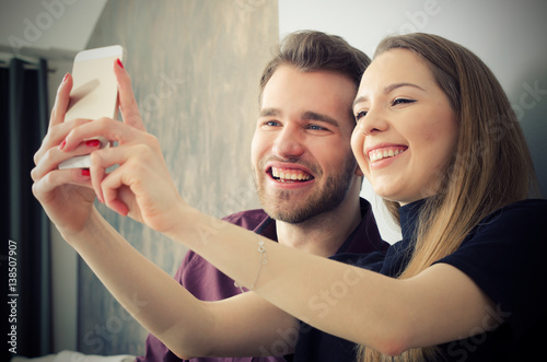 Young couple taking a selfie photo