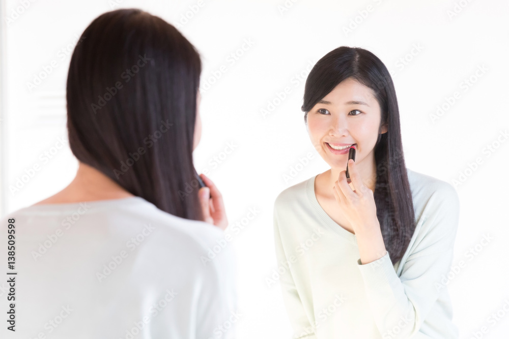 attractive asian woman in powder room attractive asian woman in powder room