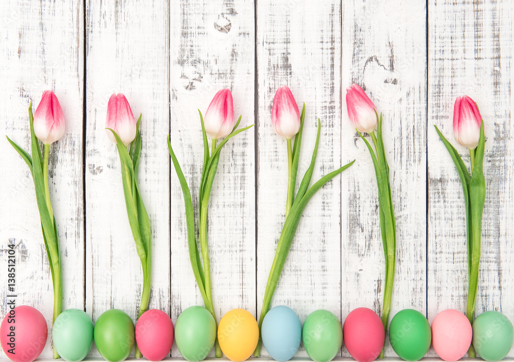Easter decoration eggs tulip flowers wooden background