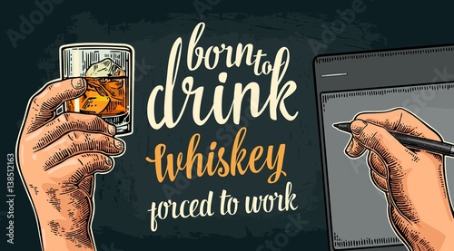 Male handw holding glass and stylus. Born to drink whiskey