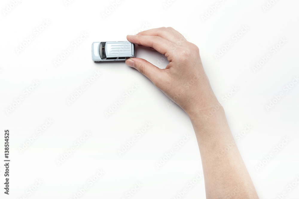 woman hand hold a mini car isolated white woman hand hold a mini car isolated white