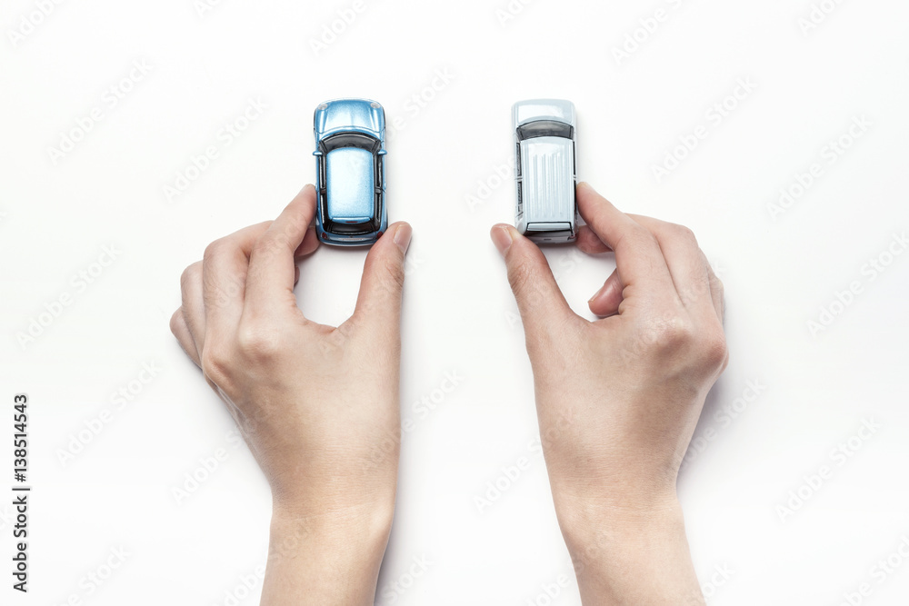 woman hand hold a mini car isolated white woman hand hold a mini car isolated white