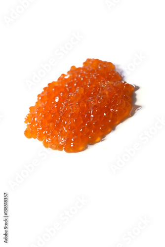 Salmon red caviar on white background. Delicious diet