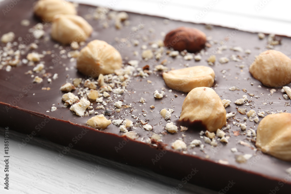 Dark chocolate with nuts, closeup