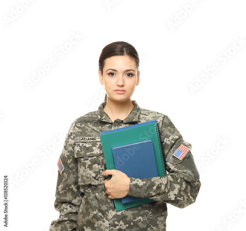 Fotografi Pretty female cadet of military school on white background